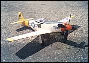 Mustang P-51D span 700 mm, for a Modela motor, weight 92g.